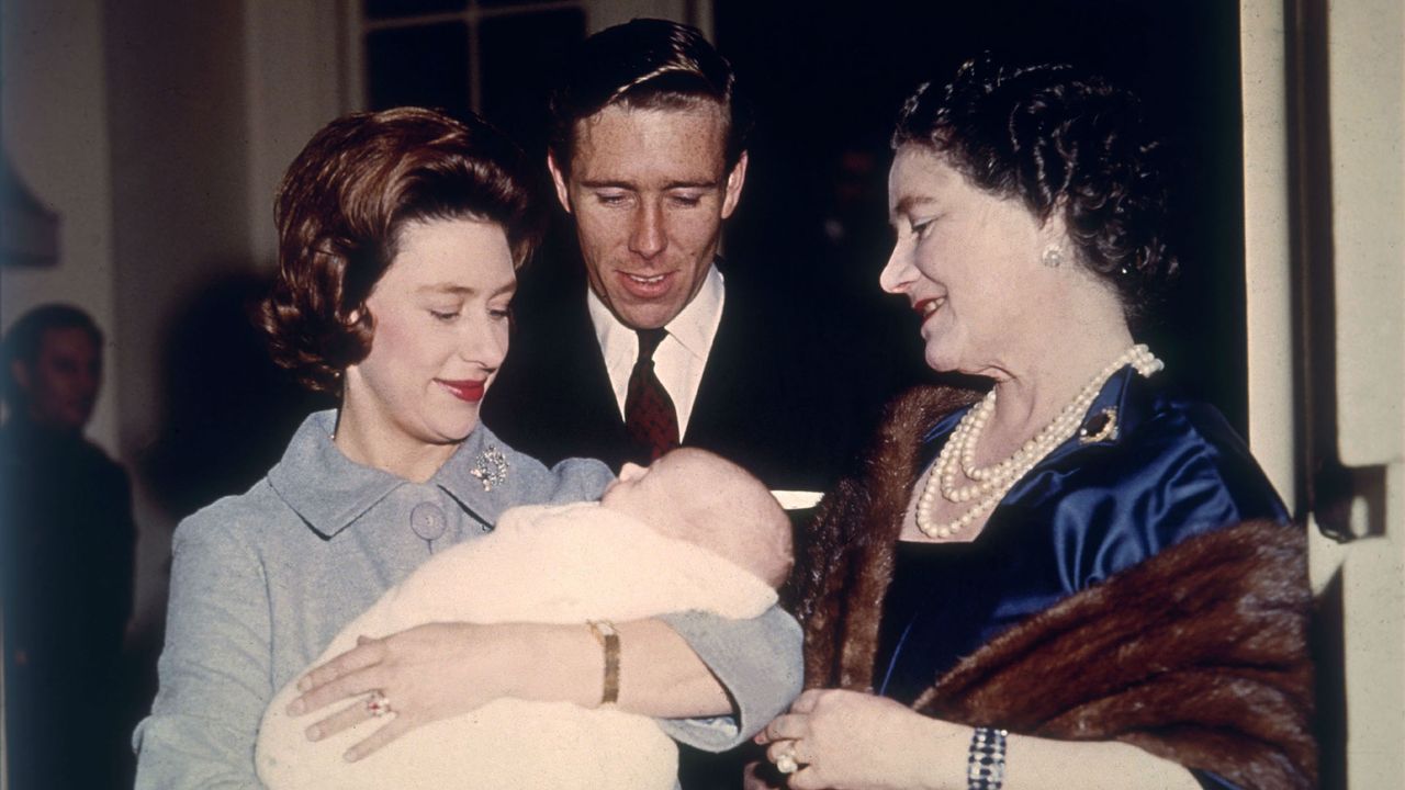 The Queen Mother is introduced to Princess Margaret and Lord Snowdon's son David in 1961