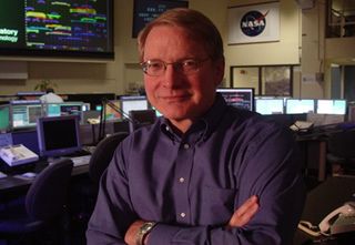 Planetary Scientist Don Yeomans tracks near-Earth objects at NASA's Jet Propulsion Laboratory.