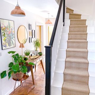 staircase with rug on stairs