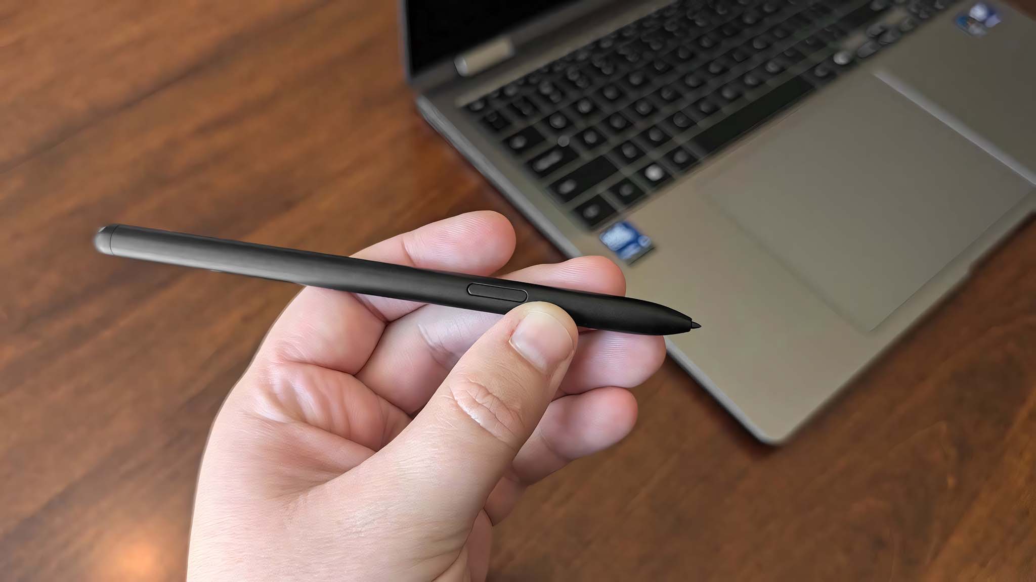 Samsung Galaxy Book5 Pro 360 S Pen being held in my hand.