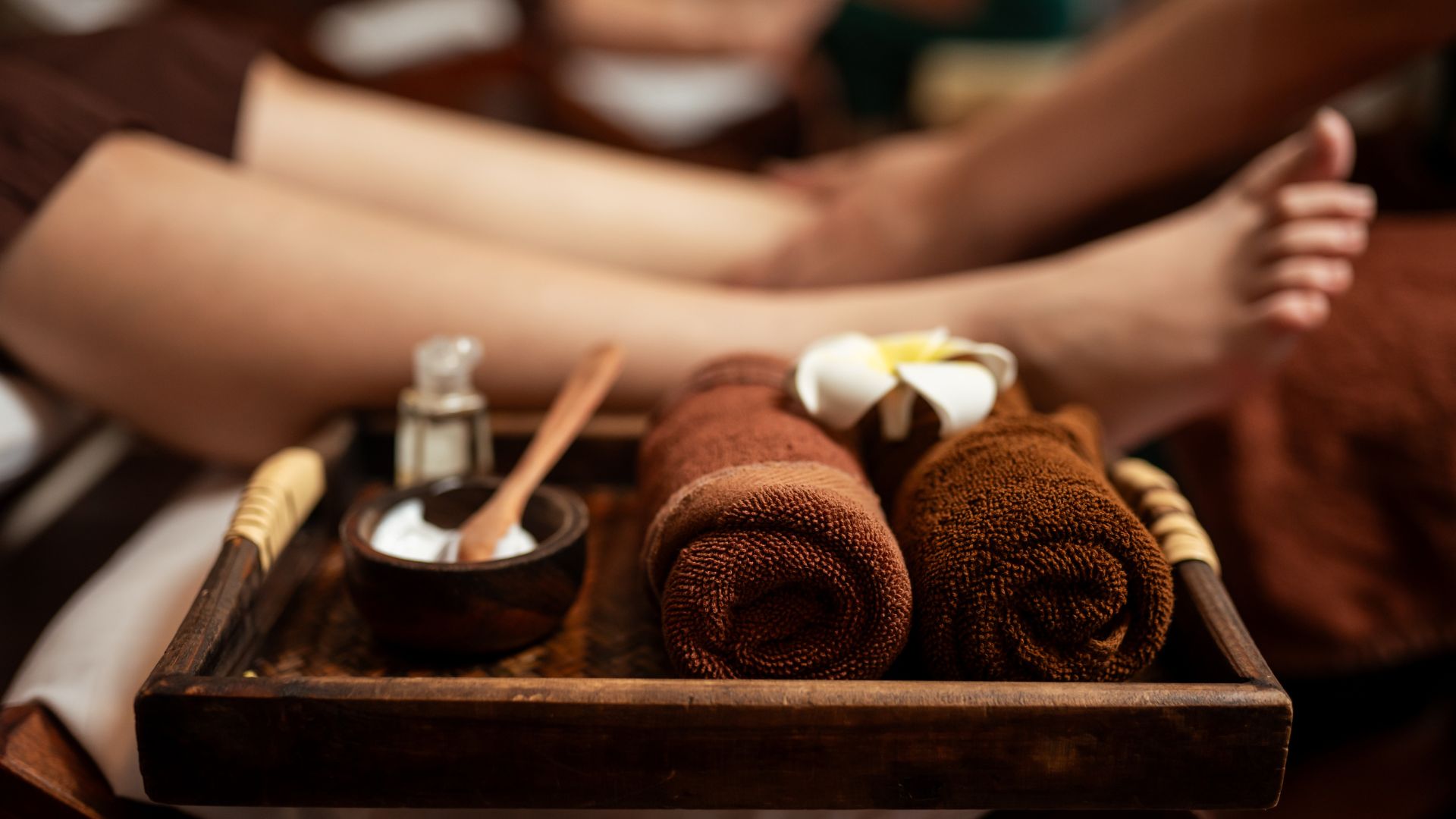 Person getting a pedicure at a spa