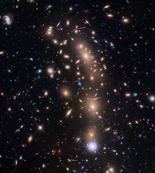 An unannotated view of the galaxy cluster MACS J0416.1-2403 taken by the Hubble Space Telescope.