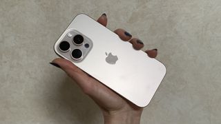 iPhone 16 Pro in hand