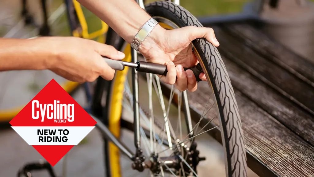 Cyclist fixes a puncture