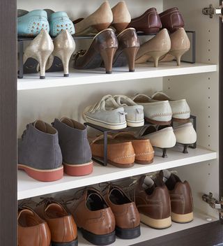 cupboard with shoe racks and shoes