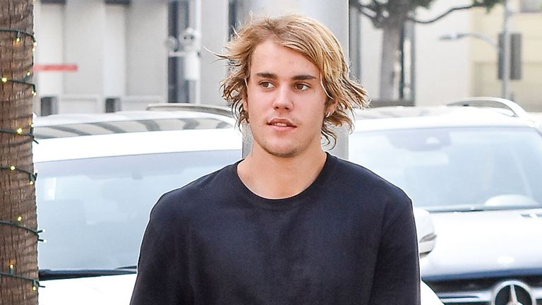 Hair, Hairstyle, Luxury vehicle, Blond, White-collar worker, Car, Vehicle, Surfer hair, Photography, Fictional character,