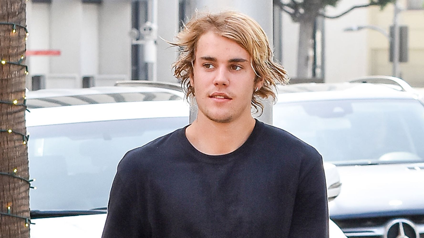 Hair, Hairstyle, Luxury vehicle, Blond, White-collar worker, Car, Vehicle, Surfer hair, Photography, Fictional character,