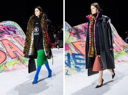 Models are seen wearing multiple layers of outerwear, including leopard-print furs, leather and wind jackets. Both models wear bright coloured high heels
