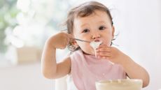 Baby eating turkey purée