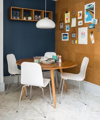 room with cork wall and wooden table