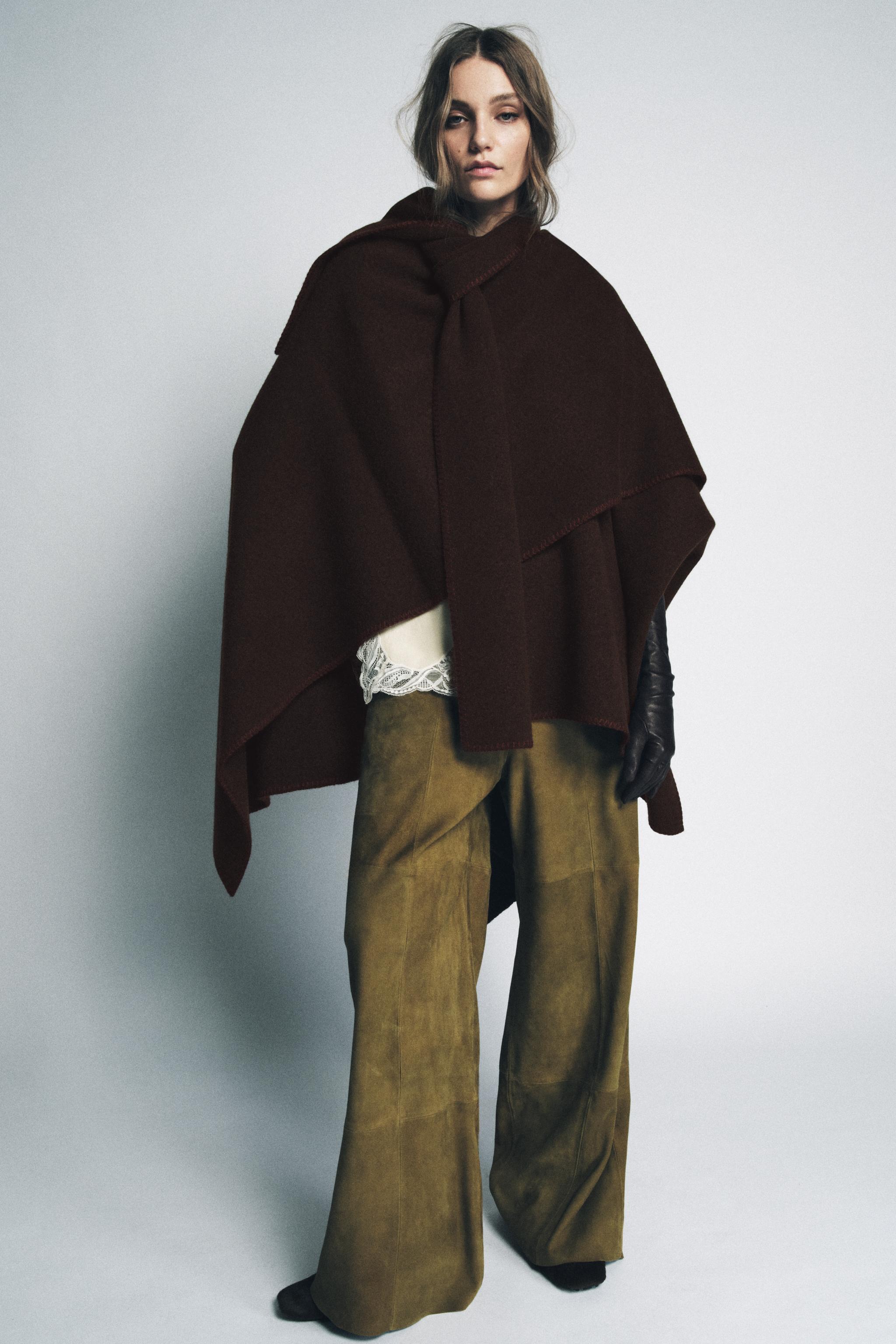 Knit Cape With Contrast Thread Scarf