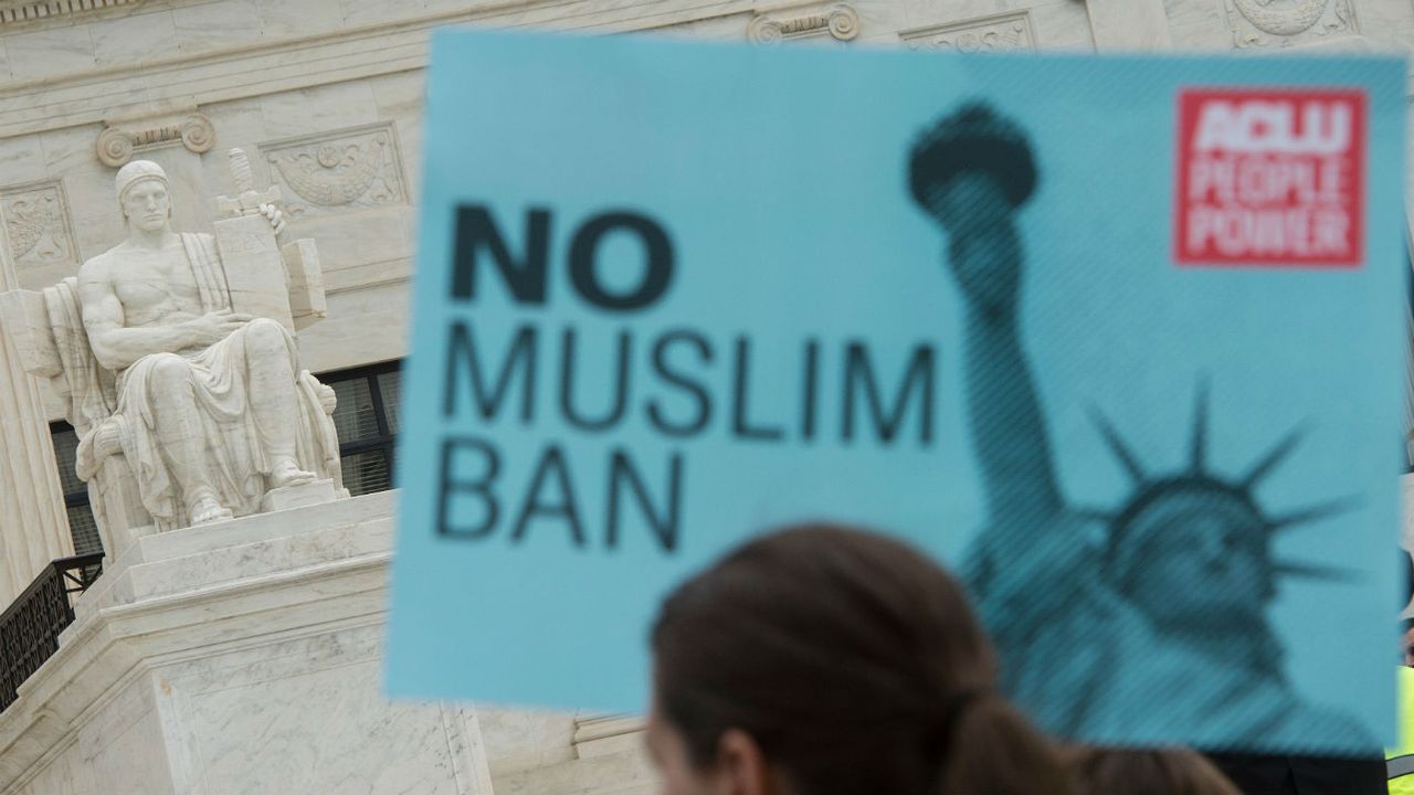 Activists rally outside the Supreme Court ahead of Tuesday&amp;#039;s ruling