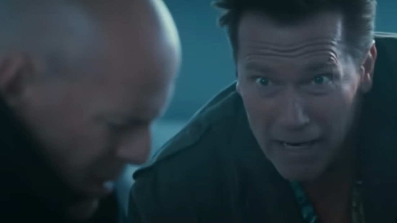 Arnold Schwarzenegger and Bruce Willis in a tight spot in The Expendables 2