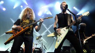 Dave Mustaine (L) and James Hetfield of Metallica perform at Day Four of the bands' 30th Anniversary shows at The Fillmore on December 10, 2011 in San Francisco, California.