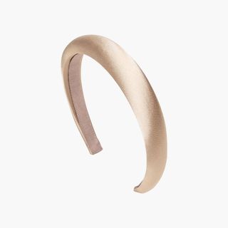 A cream coloured silk-satin headband from Jennifer Behr.