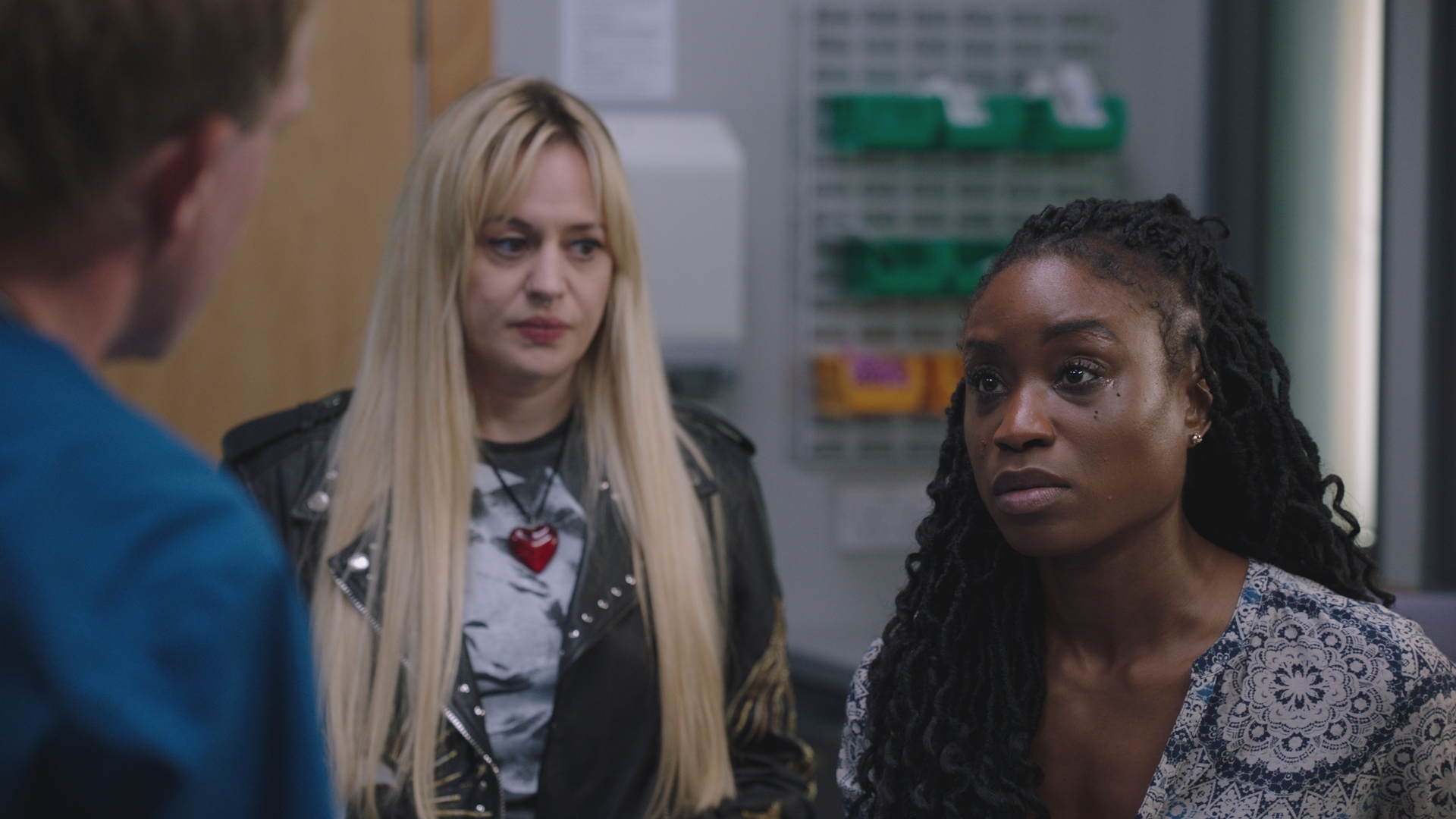 A tearful Ngozi talks to Dylan Keogh while concerned Nicole stands by her side.