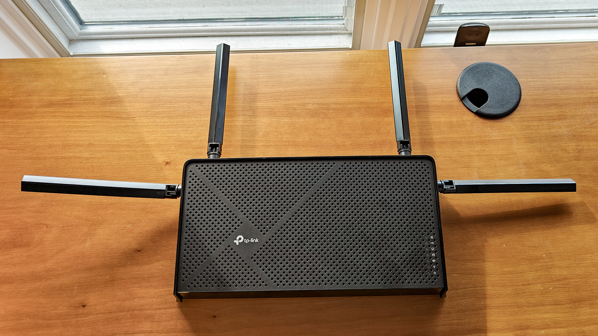 TP-Link Archer BE3600 on a windowsill