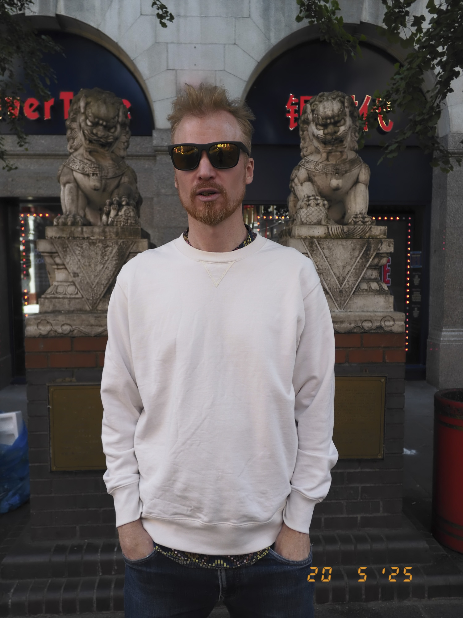 Male portrait in London's china town, street scene