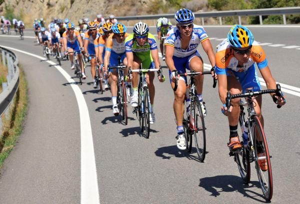 The Garmin-Slipstream team controls things for Tyler Farrar.