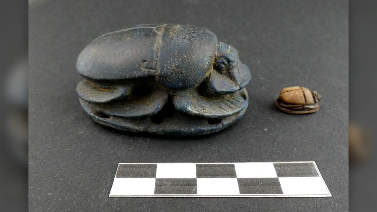 Ancient Egyptian artifacts, such as these scarabs, were found in the man's tomb.