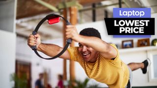 Man holding Ring Fit Adventure ring in living room setting 