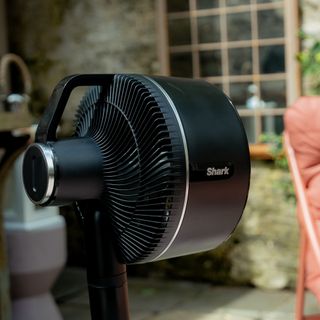 Shark FlexBreeze Portable Fan set up in outdoor garden