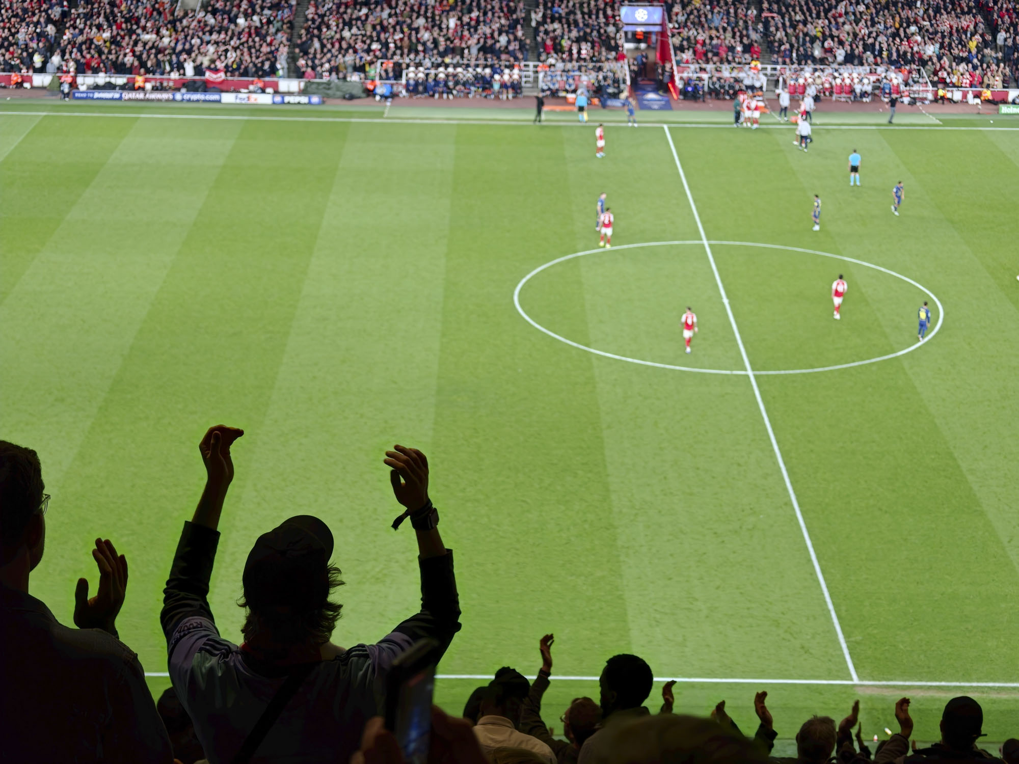 Action photos during a Champions League soccer match at Arsenal's Emirates stadium, taken with the Oppo Find X9 Ultra and teleconverter lens