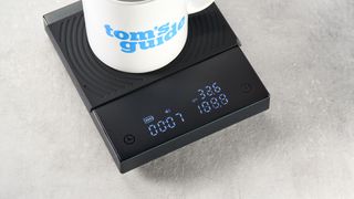 the Timemore Black Mirror Basic 2 coffee scale black compact premium coffee scale with a waterproof surface and rechargeable USB-C battery