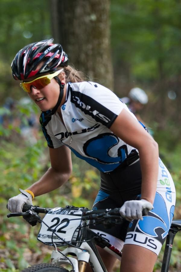 Adrienne Pichette (Equipe du Quebec) gets out of the saddle on an uphill