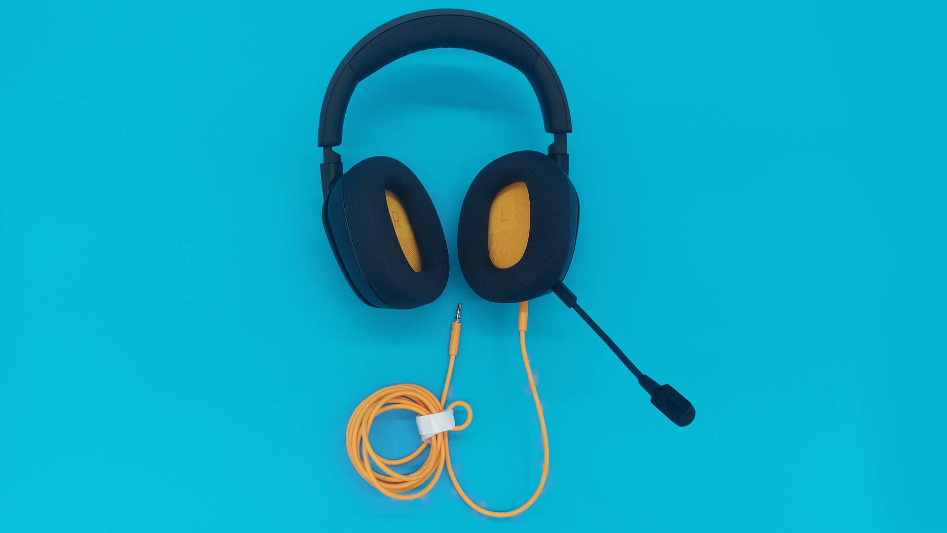 The Glorious GHS Eternal and GHS Eternal RGB wired gaming headsets in white and black, seen from various angles.