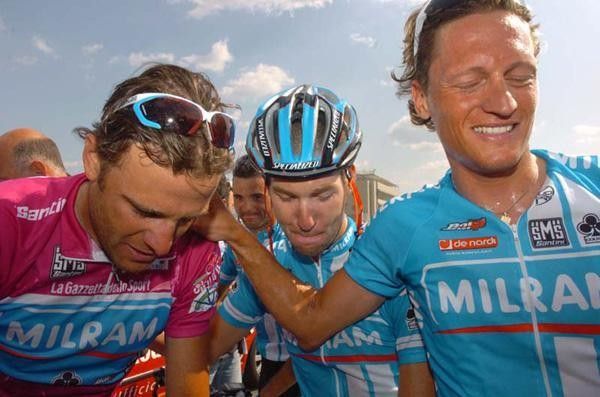 Petacchi is congratulated by his Milram team.