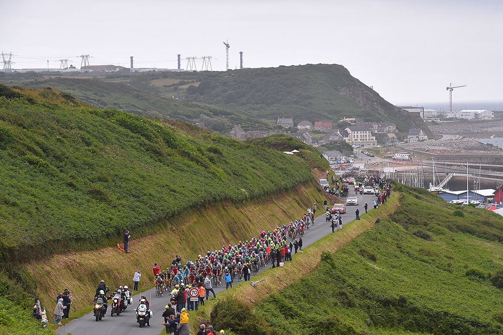 The peloton rides along the coast during stage 2
