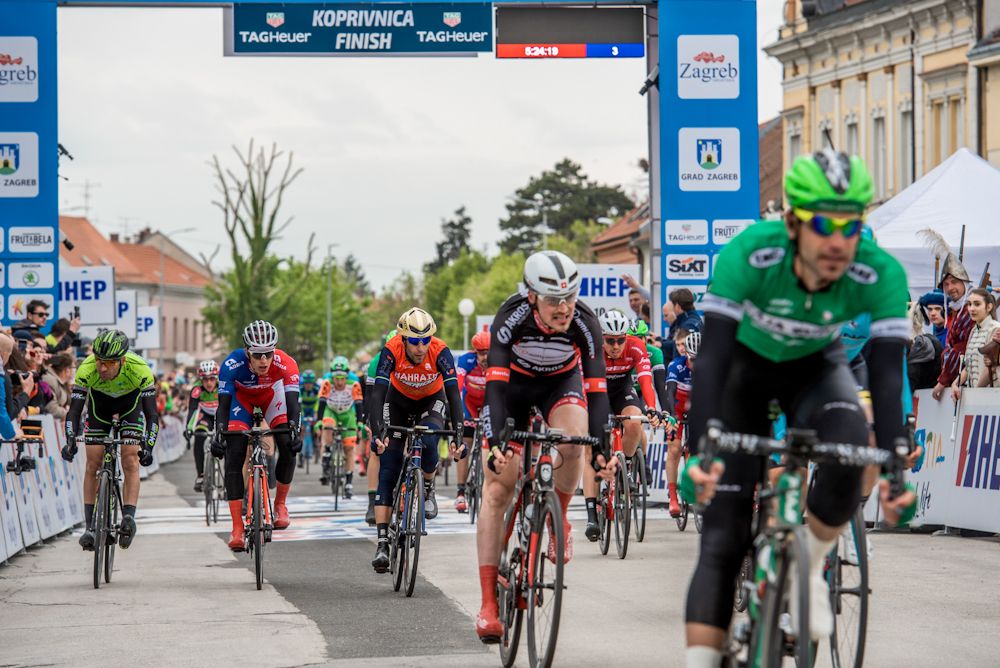 Riders cross the finish line during stage 1 at Tour of Croatia