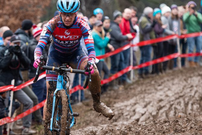 A rider makes her way down a slick descent