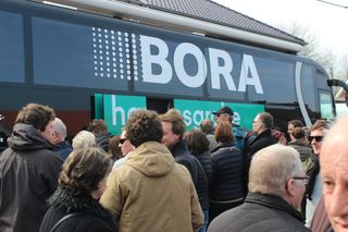 The crowds gather outside the Bora bus for a glimpse of Peter Sagan