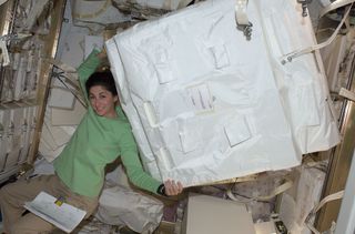 Astronaut Stott Inside H-II Transfer Vehicle