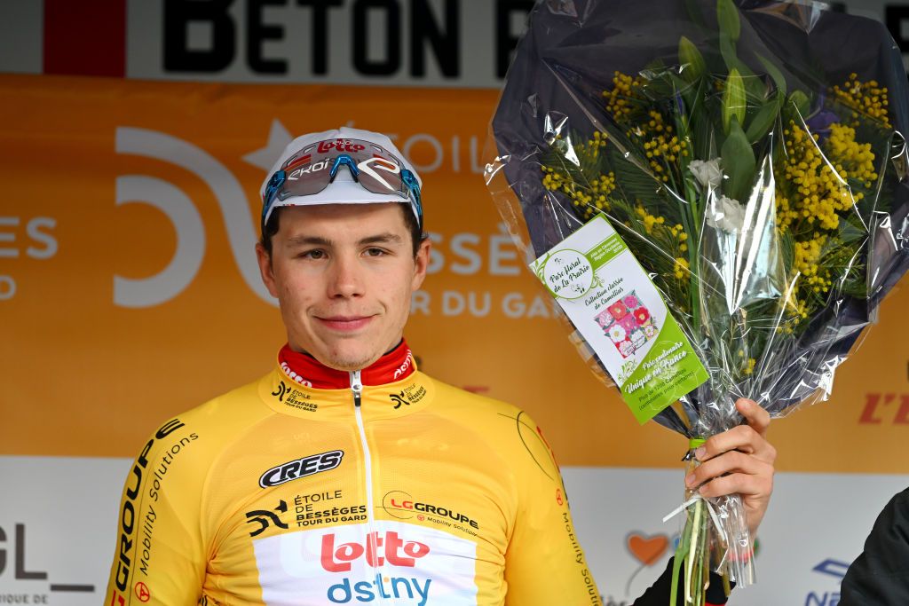 ALES FRANCE FEBRUARY 05 Arnaud De Lie of Belgium and Team Lotto Dstny celebrates at podium as Yellow Points Jersey during the 53rd Etoile de Besseges Tour Du Gard 2023 Stage 5 a 1066km individual time trial stage from Ales to Ales EDB2021 on February 05 2023 in Ales France Photo by Luc ClaessenGetty Images