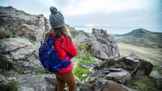 A woman hiking a scenic trail near Salt Lake City
