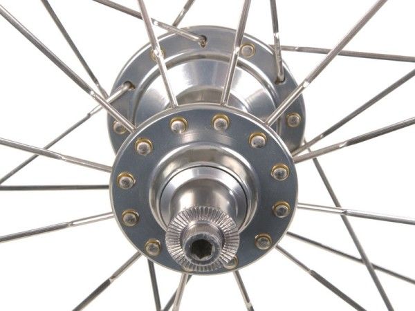 Brass washers keep the Sapim spoke heads firmly in place to help keep fatigue failures at bay.