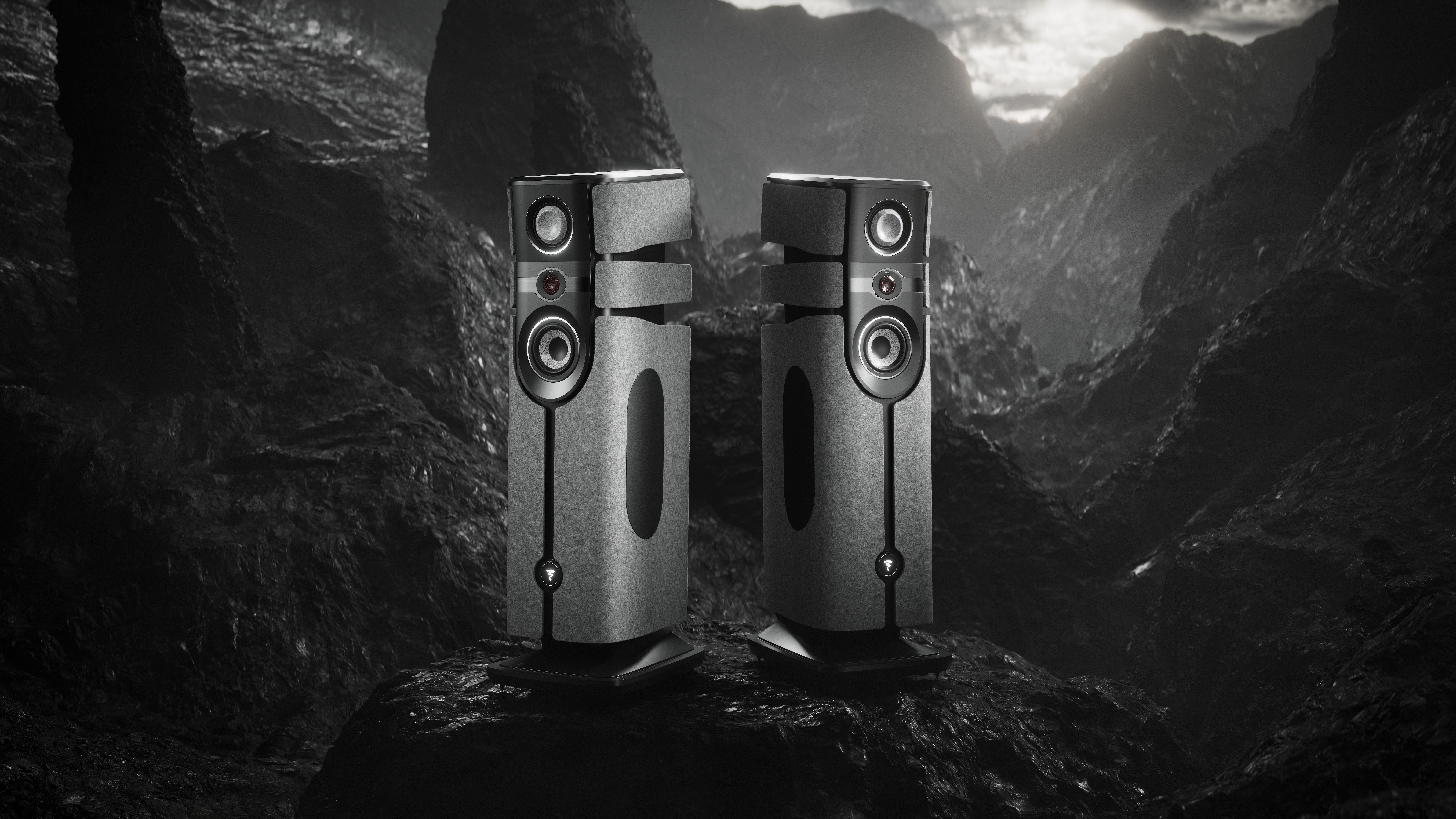 Focal Diva Alta Utopia wired speaker system on black mountains 