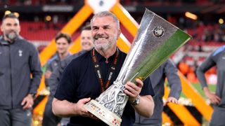 Ange Postecoglou, Manager of Tottenham Hotspur, celebrates with the UEFA Europa League trophy after his team's victory in the UEFA Europa League Final 2025 between Tottenham Hotspur and Manchester United at Estadio de San Mames on May 21, 2025 in Bilbao, Spain. 