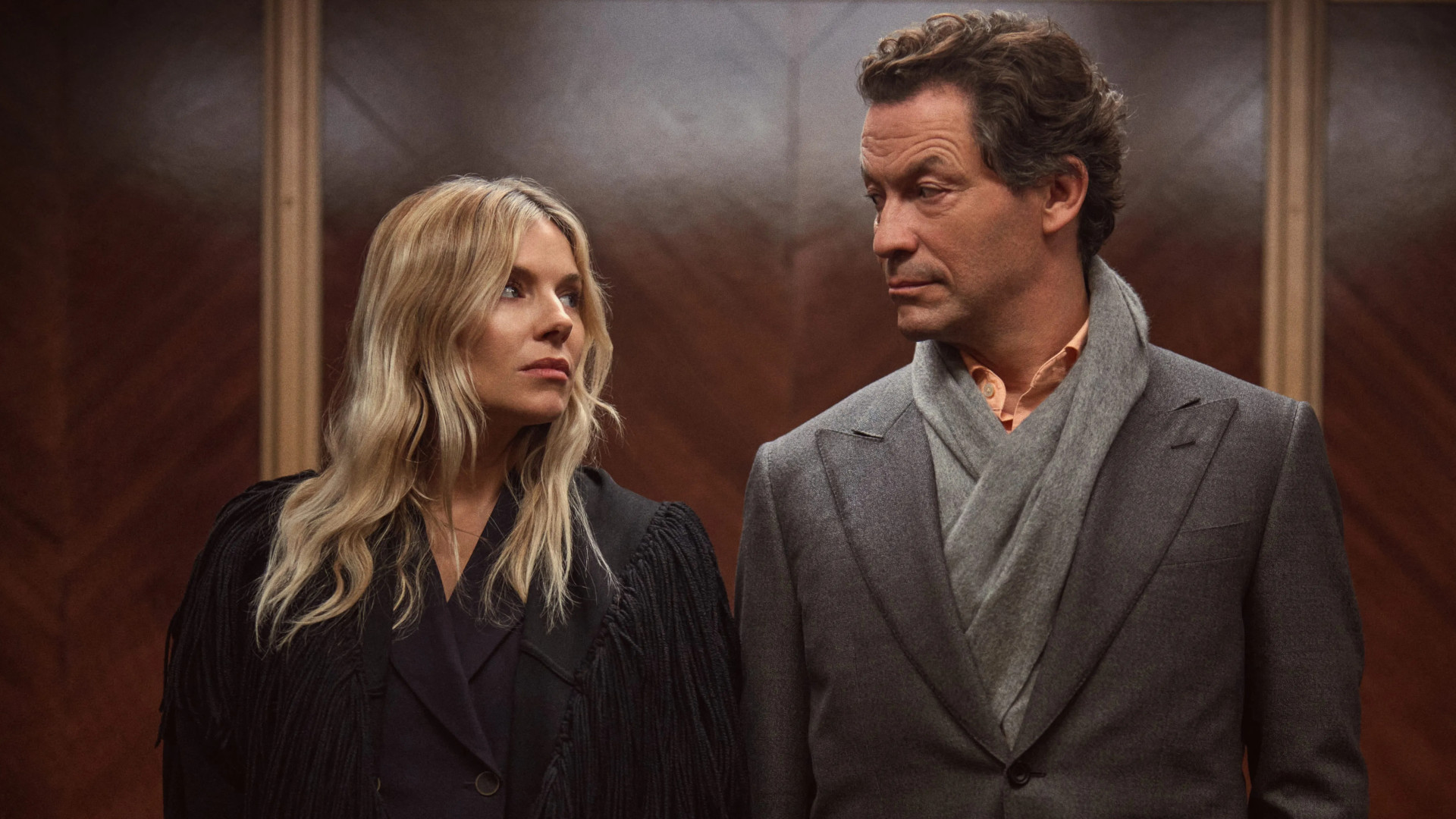 Sienna Miller and Dominic West in still from War