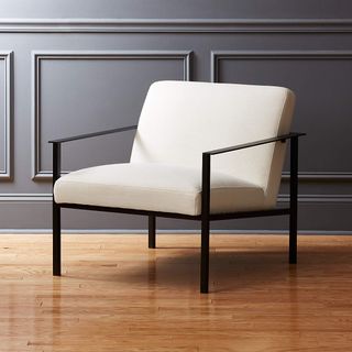 White chair with black frame