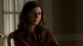 Meadow Soprano looking disappointed while sitting in a chair in the kitchen in The Sopranos