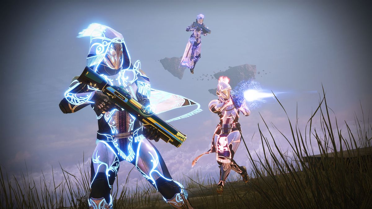 Three Destiny guardians in glowing armour