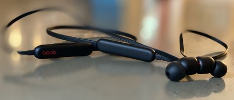 A close up of the Beats Flex wireless earphones in black