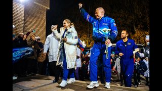 Russian actress Yulia Peresild with cosmonaut Oleg Novitsky and film director Klim Shipenko after their return from the International Space Station on Sunday (Oct. 17).