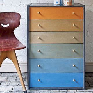 wooden drawers in orange to blue shade