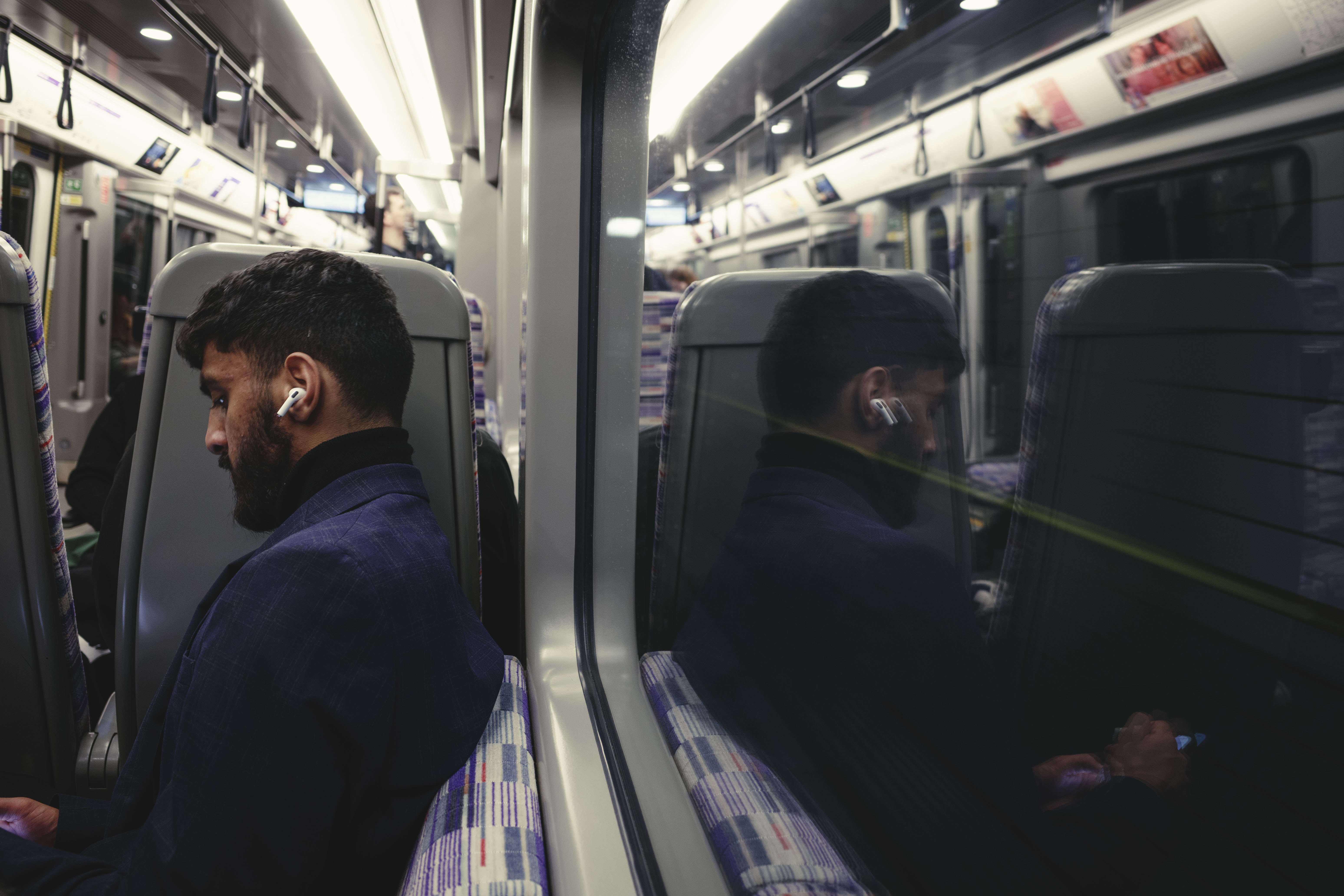 Ricoh GR IV sample images - commuter on underground
