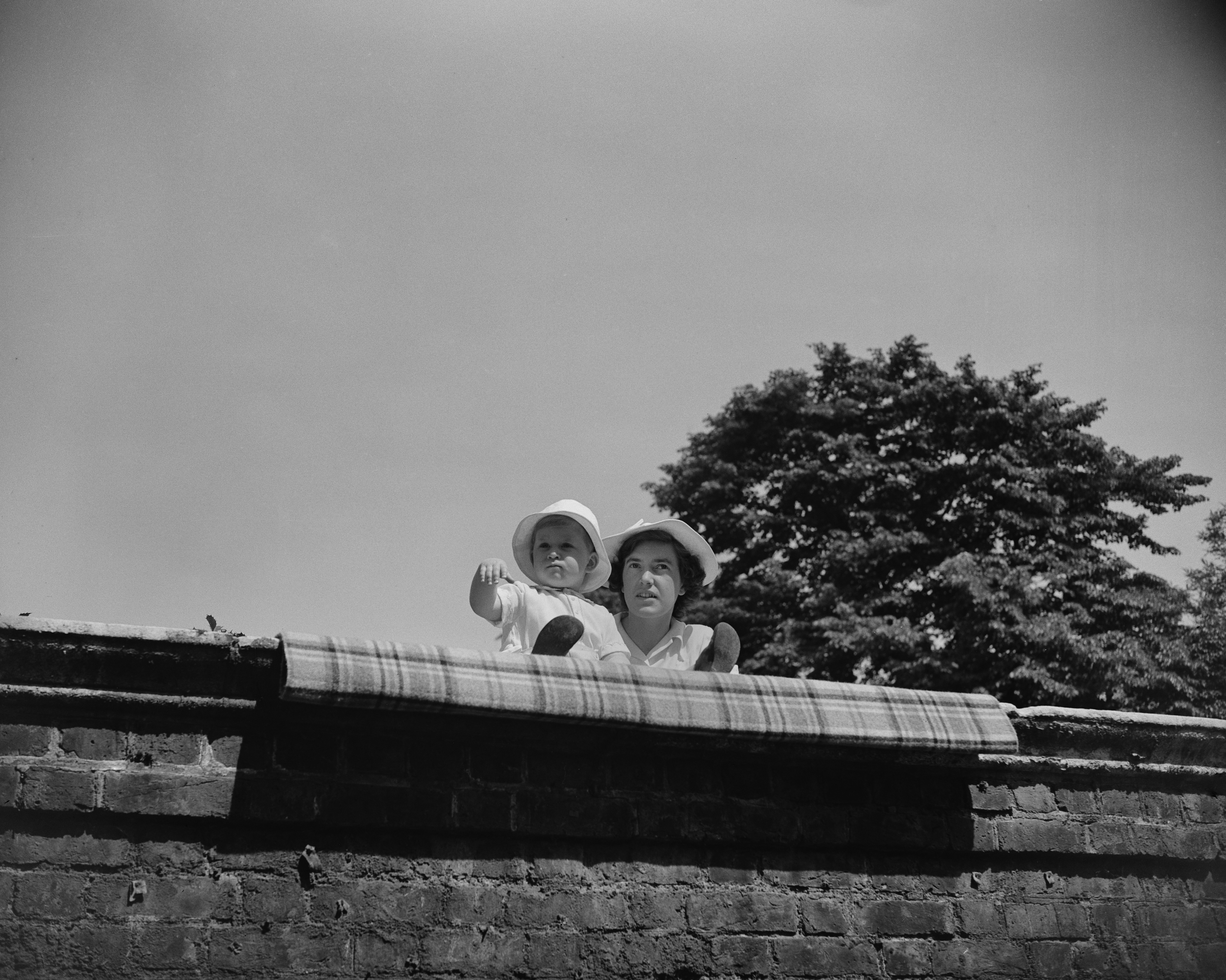Prince Charles with Nurse Mabel Anderson, royal nanny at Clarence House, watches the royal procession as the Duke of Edinburgh's birthday took place on Horse Guards Parade, London, UK, June 1951